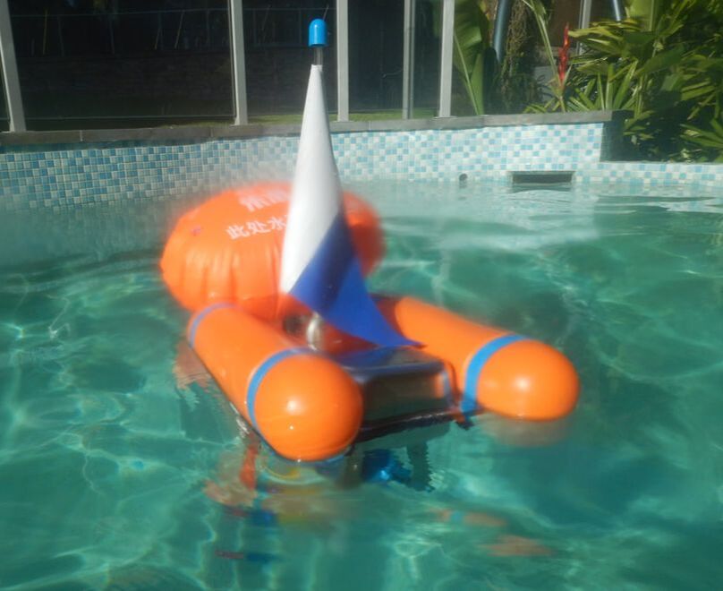 A Portahookah hookah diving system floating in a swimming pool Picture