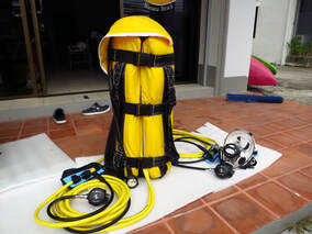 Surface air supplied underwater breathing apparatus, Sasuba ready for hookah diving for 2 people with scuba tank float and hookah air hoses attached to full face Ocean Reef divers masks with also standard scuba breathing regulators.